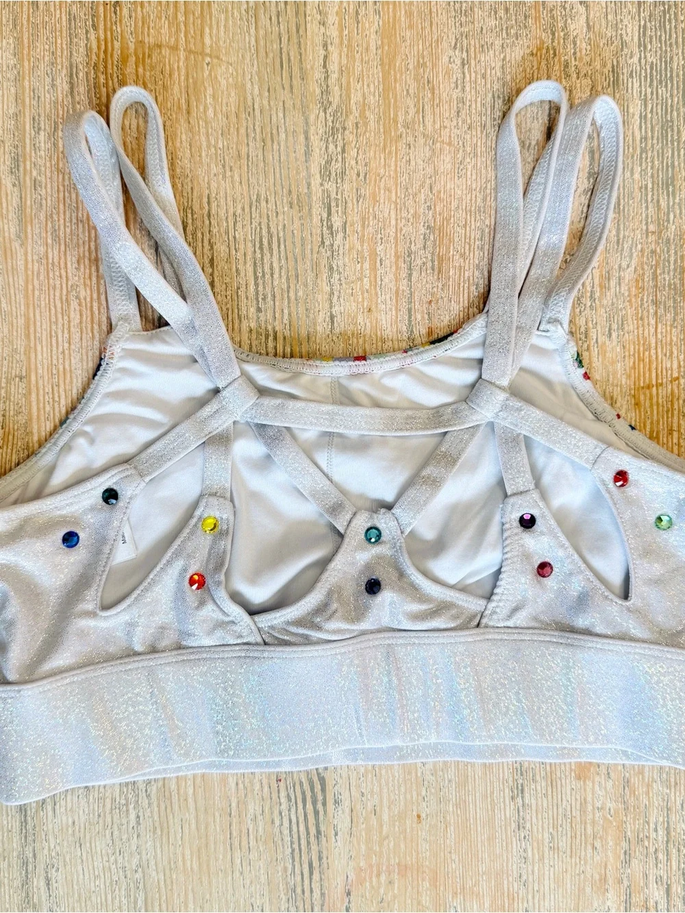 Rebel Athletic Women’s Sparkle Confetti Sports Bra with 'REBEL' Graphic - Silver